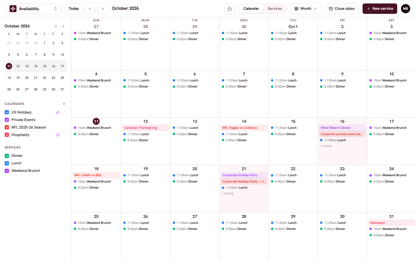 The month view with service chips, holiday labels, and closed Fridays tinted red